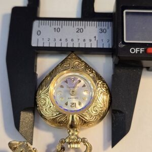 Endura RARE vtg Saxony gold plated heart shaped pocket watch w/ bow brooch